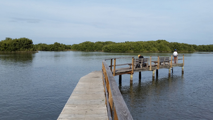 small fishing pier at the end of the boardwalk