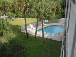 view of the pool from the private balcony