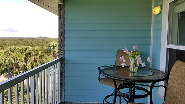 A vase of flowers on the private balcony